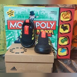 adidas Kids Black Knit Slip-On Sneakers with Yellow Stripes and Red Pull Tabs